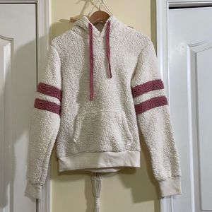 White hoodie with pink accents
